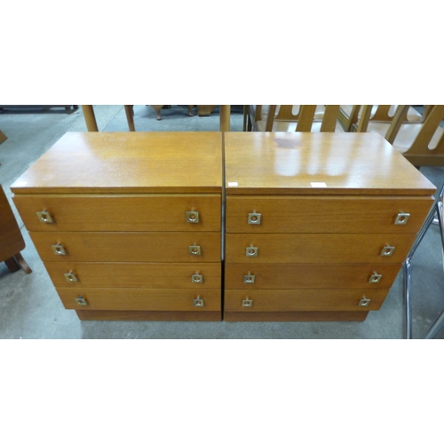 36 - A pair of teak small teak chests of drawers