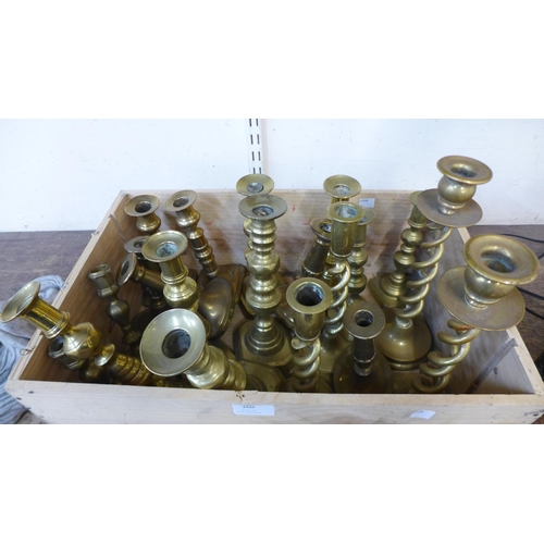 360 - Ten pairs of brass candlesticks