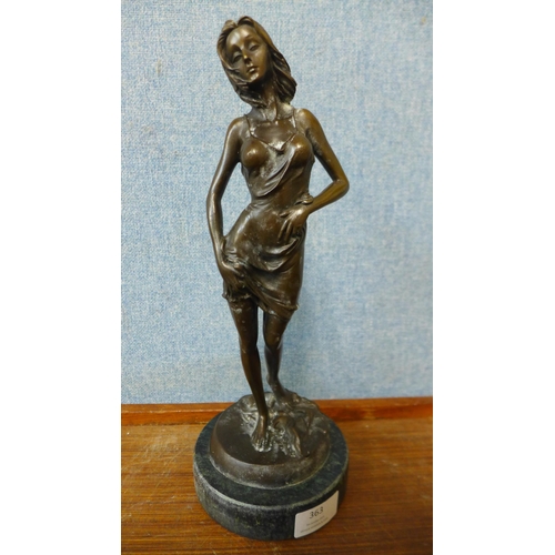 363 - A bronze figure of a lady in a negligee