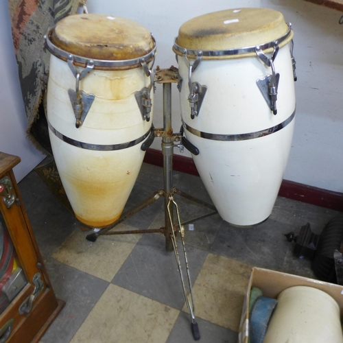 366 - A pair of percussion drums on stand