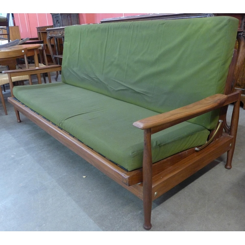 41 - A Guy Rogers teak and green fabric upholstered settee/daybed, designed by George Fejer and Eric Pham... 