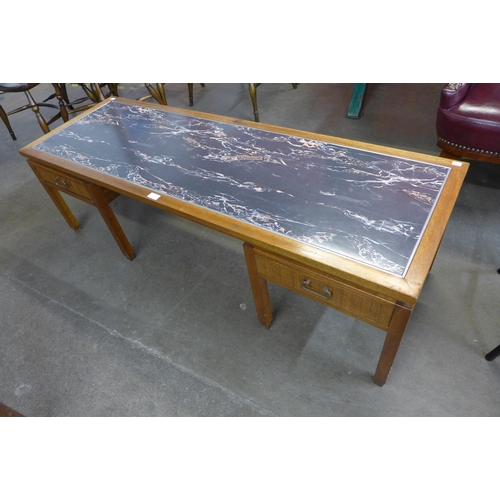 51 - A G-Plan afromosia and granite effect Formica topped coffee table