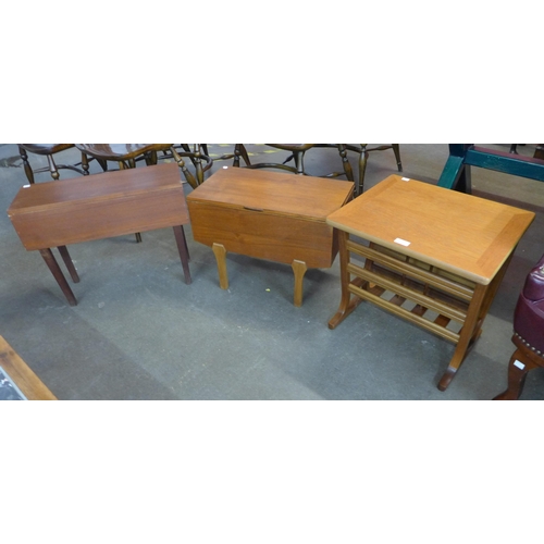 52 - A Nathan teak magazine rack and two teak sewing boxes