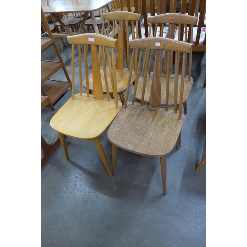 54 - A set of four Scandinavian beech kitchen chairs