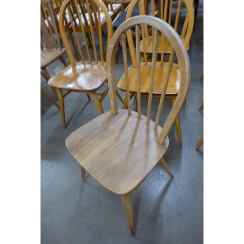 55 - A set of five Ercol Blonde elm and beech Windsor chairs