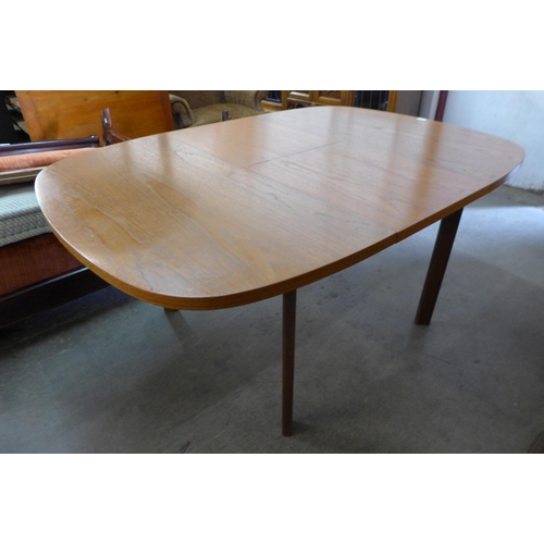 61 - A G-Plan Sierra teak extending dining table