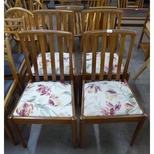 62 - A set of four Meredew teak dining chairs