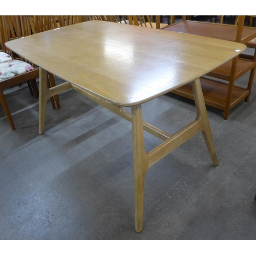 65 - A Danish style ash and beech dining table