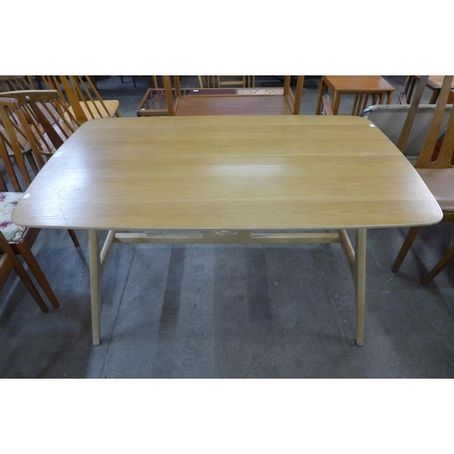 65 - A Danish style ash and beech dining table