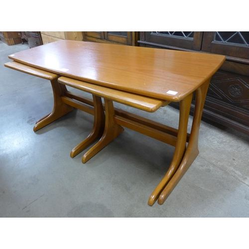 67 - A teak nest of tables