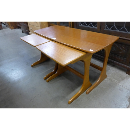 67 - A teak nest of tables