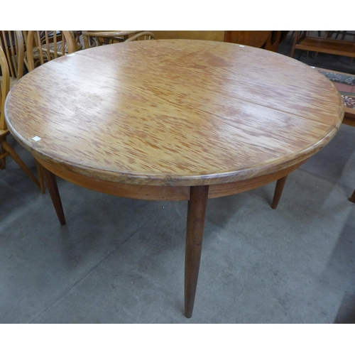 71 - A G-Plan Fresco teak circular extending dining table