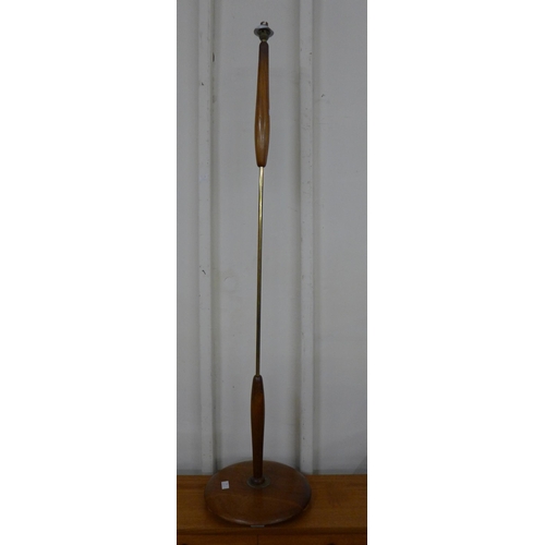 79 - A teak standard lamp