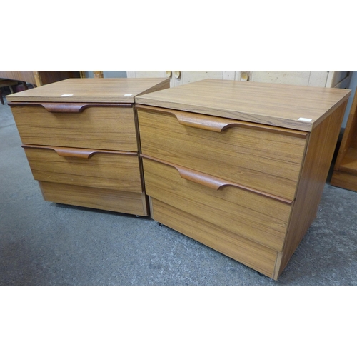 86 - A pair of teak bedside chests