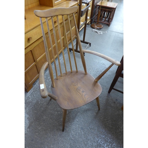 89 - An Ercol Golden Dawn elm and beech Goldsmith elbow chair