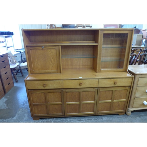 93 - A Nathan teak highboard