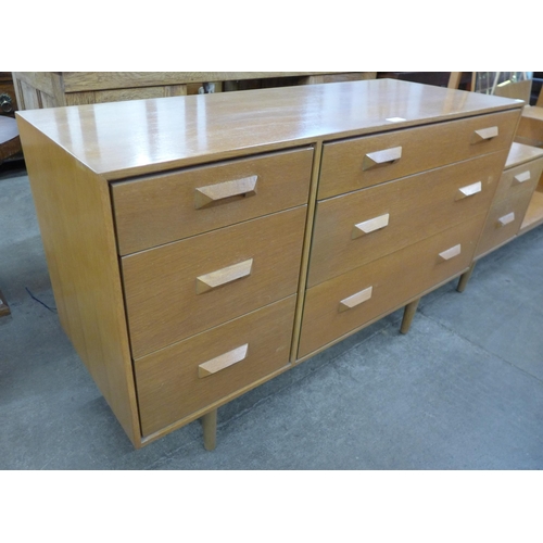 94 - A Stag Concord oak six drawer sideboard, designed by John & Sylvia Reid