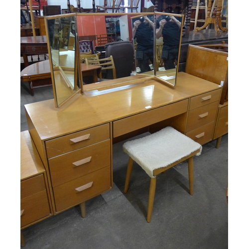 96 - A Stag Concord oak dressing table and stool, designed by John & Sylvia Reid