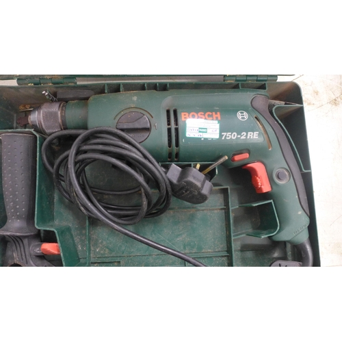 2055 - A Bosch drill (PSB 750-2 RE 240v)