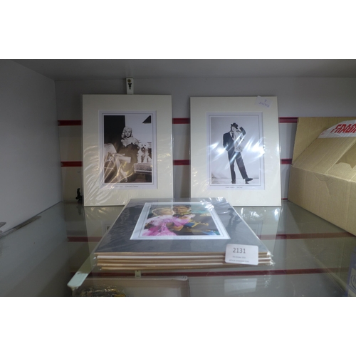 2131 - 16 x mounted /bagged prints including Frank Sinatra  Bruce lee etc