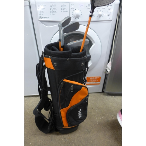 2238 - Two golf bags with clubs, trolley and a travel bag