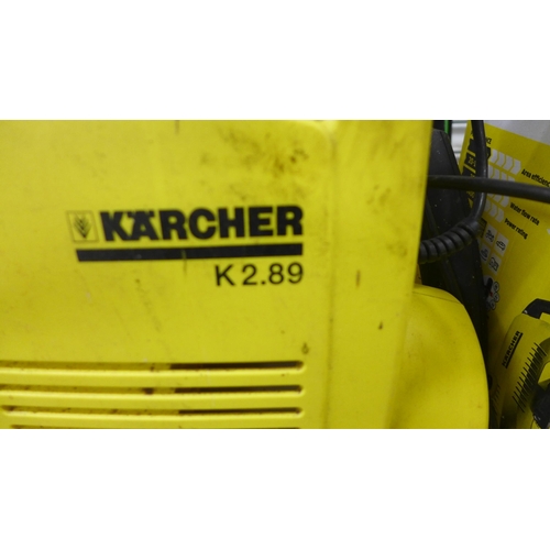 2263 - A Karcher K289 jet wash with attachments