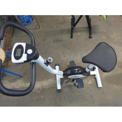 2296 - An exercise bike and an Ab Booster Plus