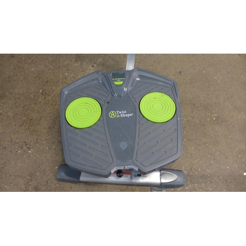 2297 - A Twist and Shape exercise board and an Opti-Walker exerciser