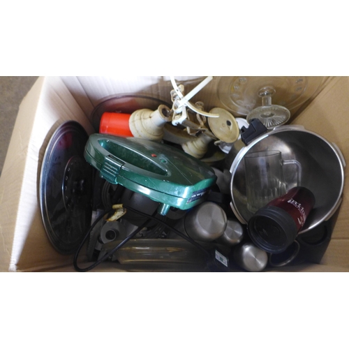 2374 - A box of kitchen ware including sandwich maker thermos flask scales and utensils