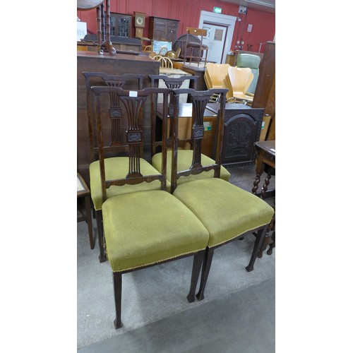 202A - A set of four Edward VII mahogany dining chairs