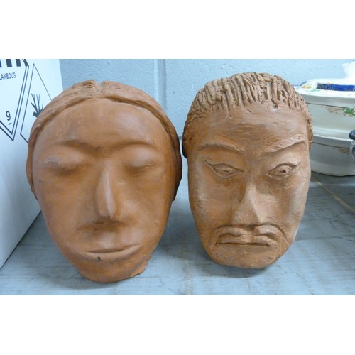 1096 - Two clay models of heads, a collection of dolls, a straw filled dog, etc. **PLEASE NOTE THIS LOT IS ... 