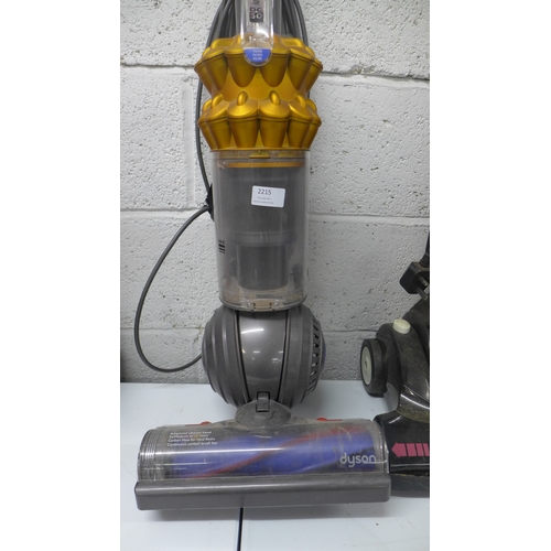 2215 - A Dyson DC50 vacuum cleaner and a Vax Quicklite Wide Track vacuum cleaner