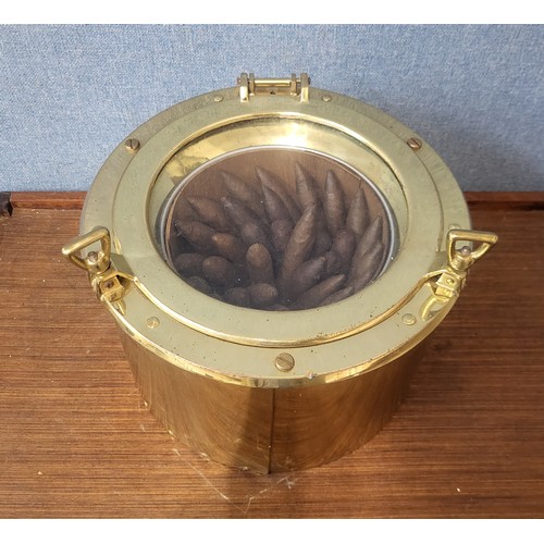 348 - A brass ships porthole cigar container, with approx. thirty five cigars