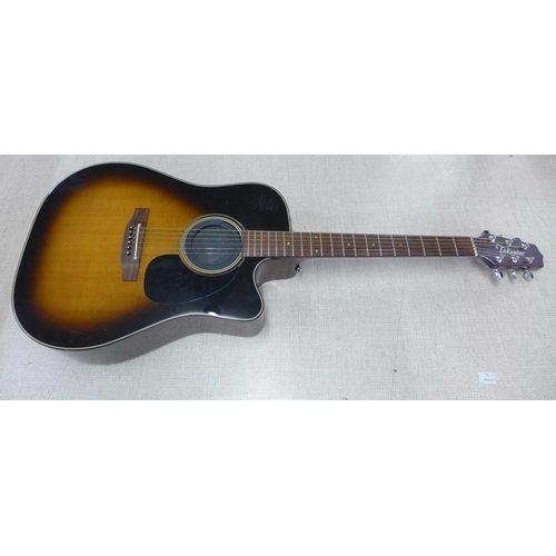 1299 - A Takamine electro-acoustic guitar, EF340SC TBS, with a hard case and CT-4BII active pre-amp