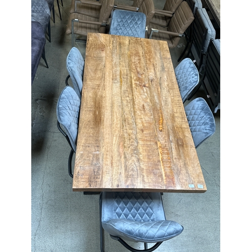 1409 - A rustic X-frame dining table and six steel grey cantilever chairs  * This lot is subject to VAT