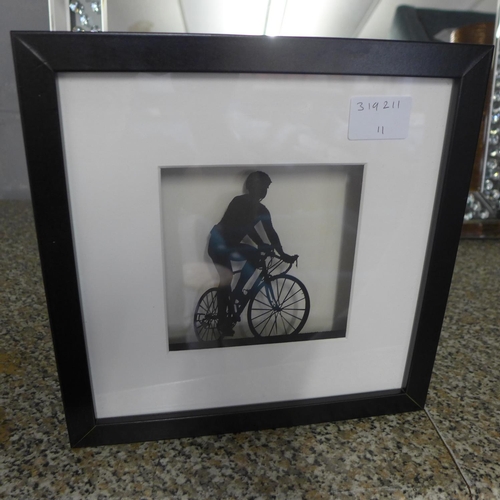 1417 - 3D wall art of a man riding a bicycle