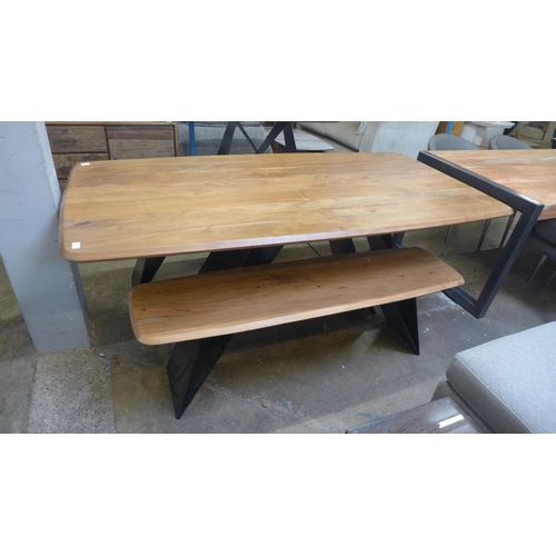 1484 - A Lucio hardwood dining table and two benches * This lot is subject to VAT