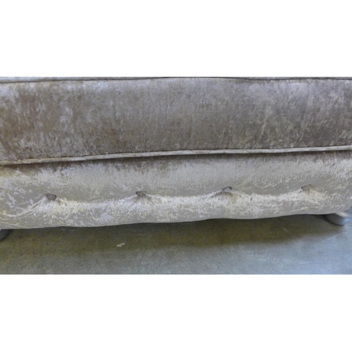 1535 - A champagne Chesterfield love seat - damaged arm