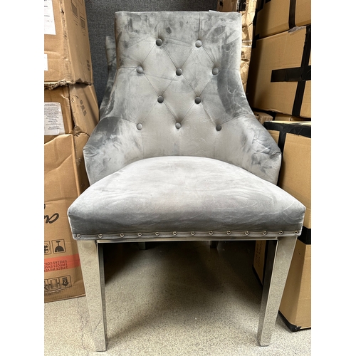 1558 - A pair of grey upholstered side chairs  * This lot is subject to VAT