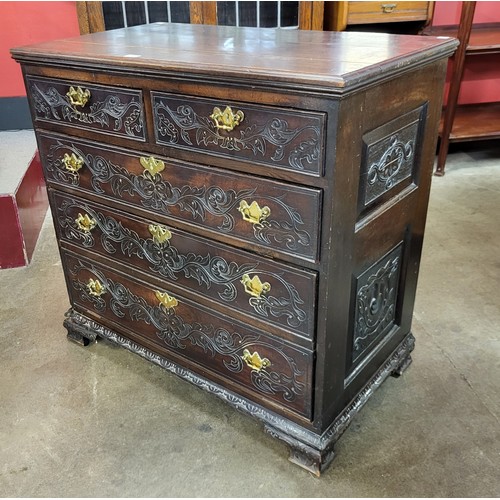 52 - An 18th Century Welsh carved oak chest of drawers