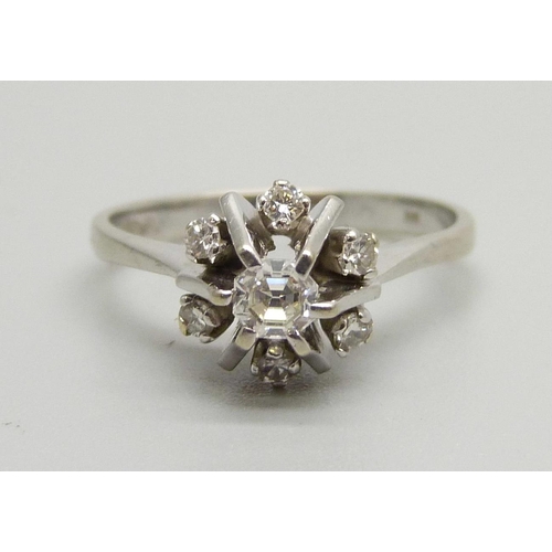 1001 - An 18ct white gold and diamond cluster ring, London 1961, 0.35ct weight, 3.98g, O