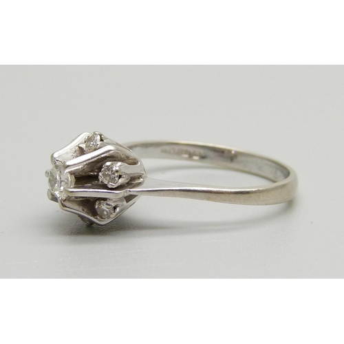 1001 - An 18ct white gold and diamond cluster ring, London 1961, 0.35ct weight, 3.98g, O