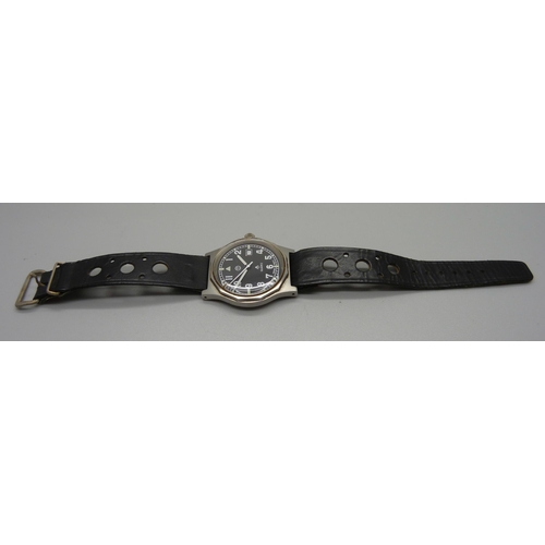 1014 - A military issue wristwatch, case back marked MIL:W-2309-BC-8273 928/FEB 03