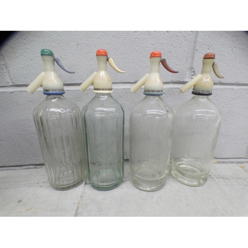 1078 - A collection of assorted glass bottles, mostly Victorian including medicine and some with labels, an... 