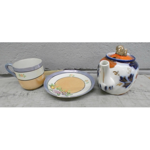 1092 - A pair of Geisha Girl cups and saucers, teapot, one other saucer, a Portuguese pierced edge plate, s... 