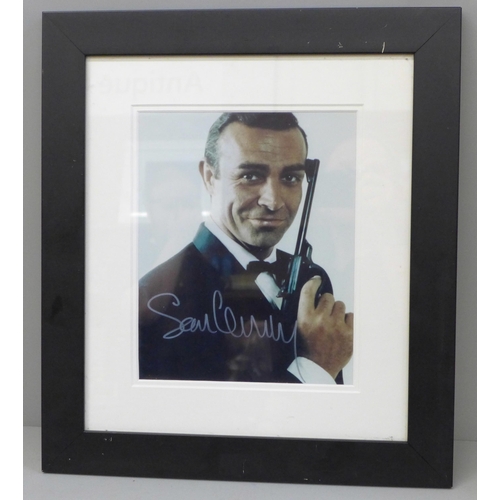 604 - A Sean Connery signed photograph with Certificate of Authentication