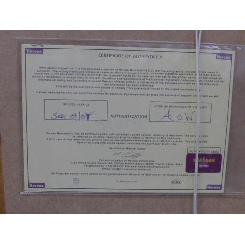 605 - A Daniel Craig signed photograph with Certificate of Authentication