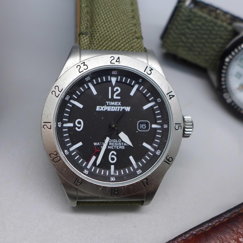 611 - Four wristwatches; Stauer, Timex Expedition, Sekonda and Cannibal