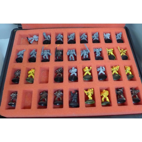 625 - A Games Workshop case and some figures