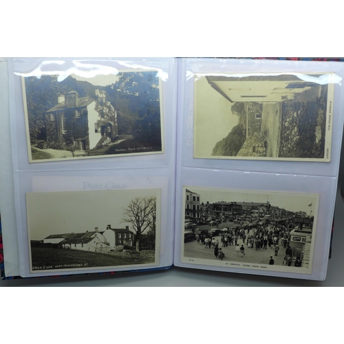 626 - Postcards; a postcard album containing 120 black and white photographic cards